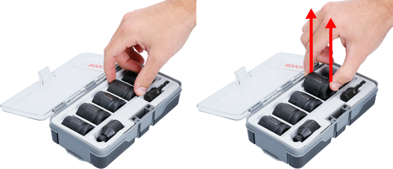 某人从7件套套筒扳手盒中取出一个套筒。