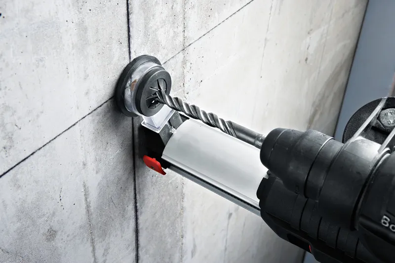 BoschGBH 2-23 REA 除尘锤钻孔混凝土。.